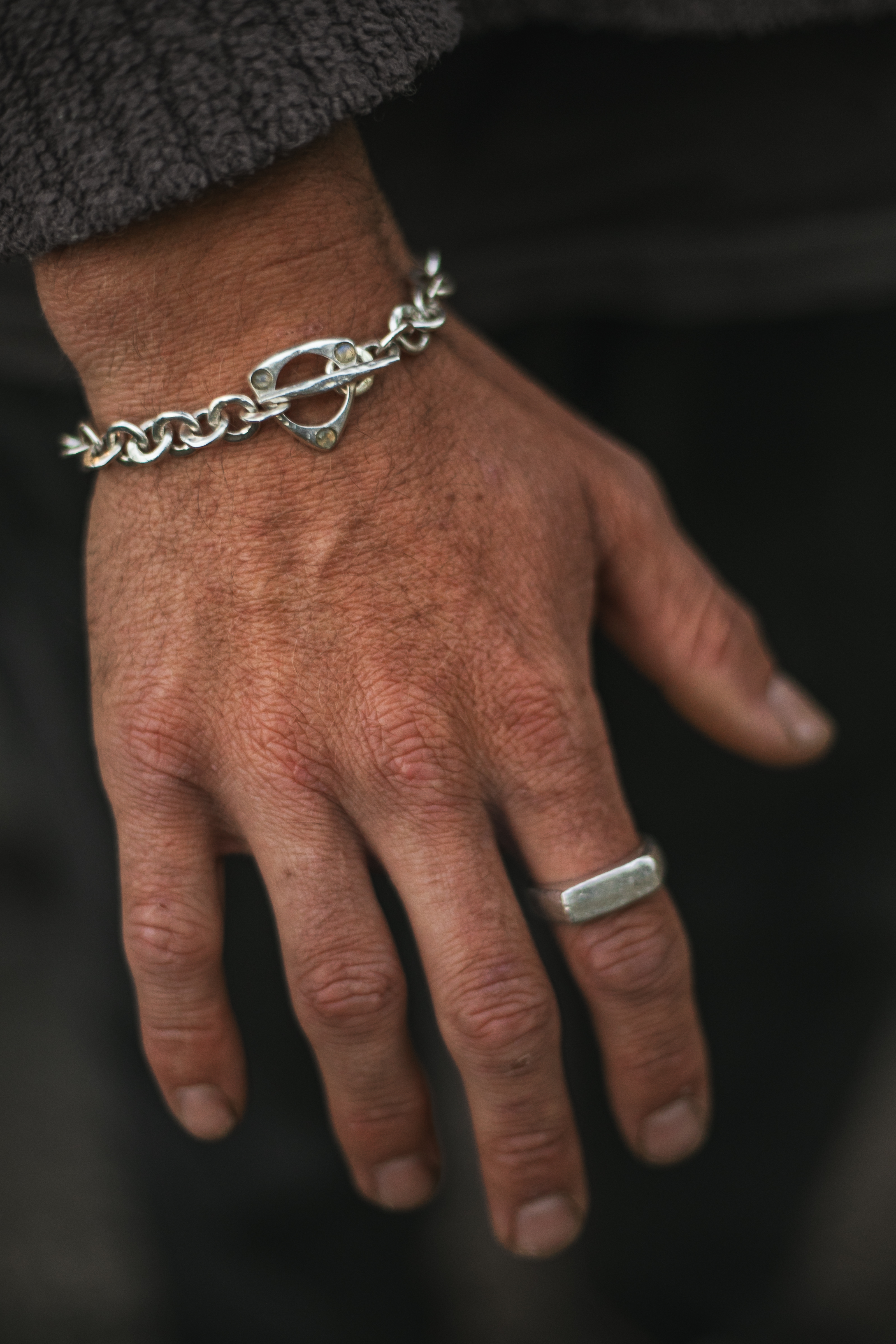 Chain bracelet and ring, worn