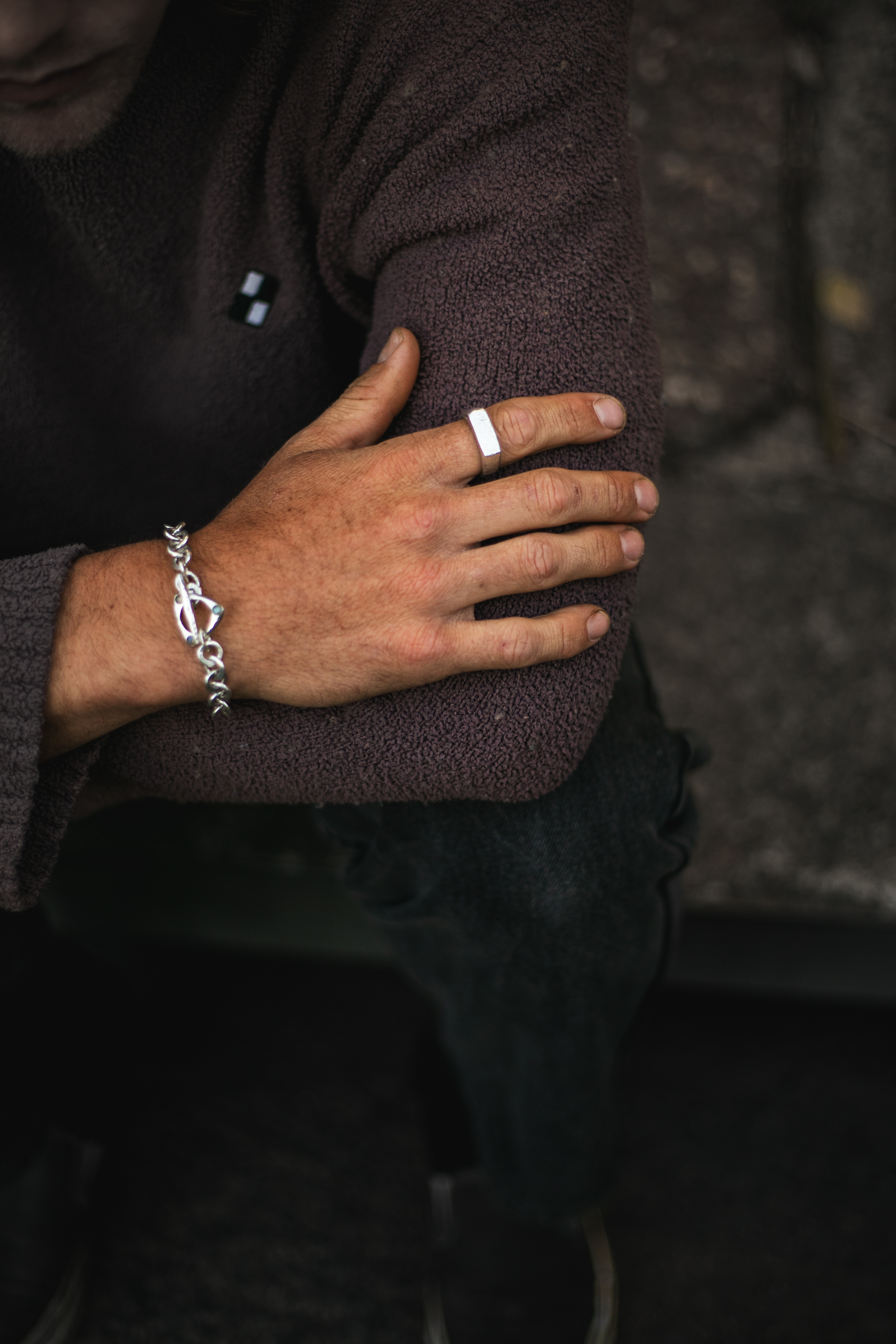 Chain bracelet and ring, worn