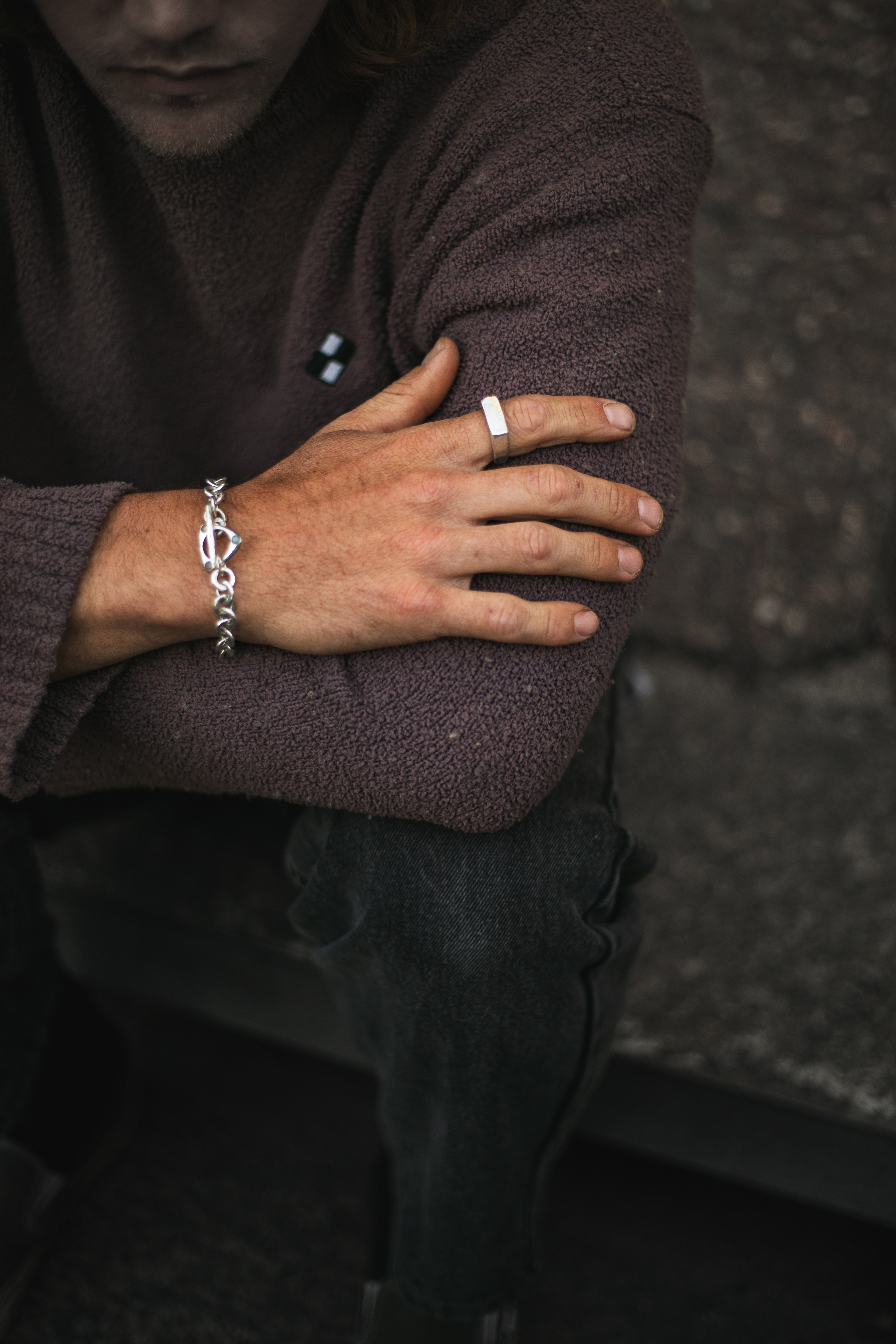 Chain bracelet and ring, worn