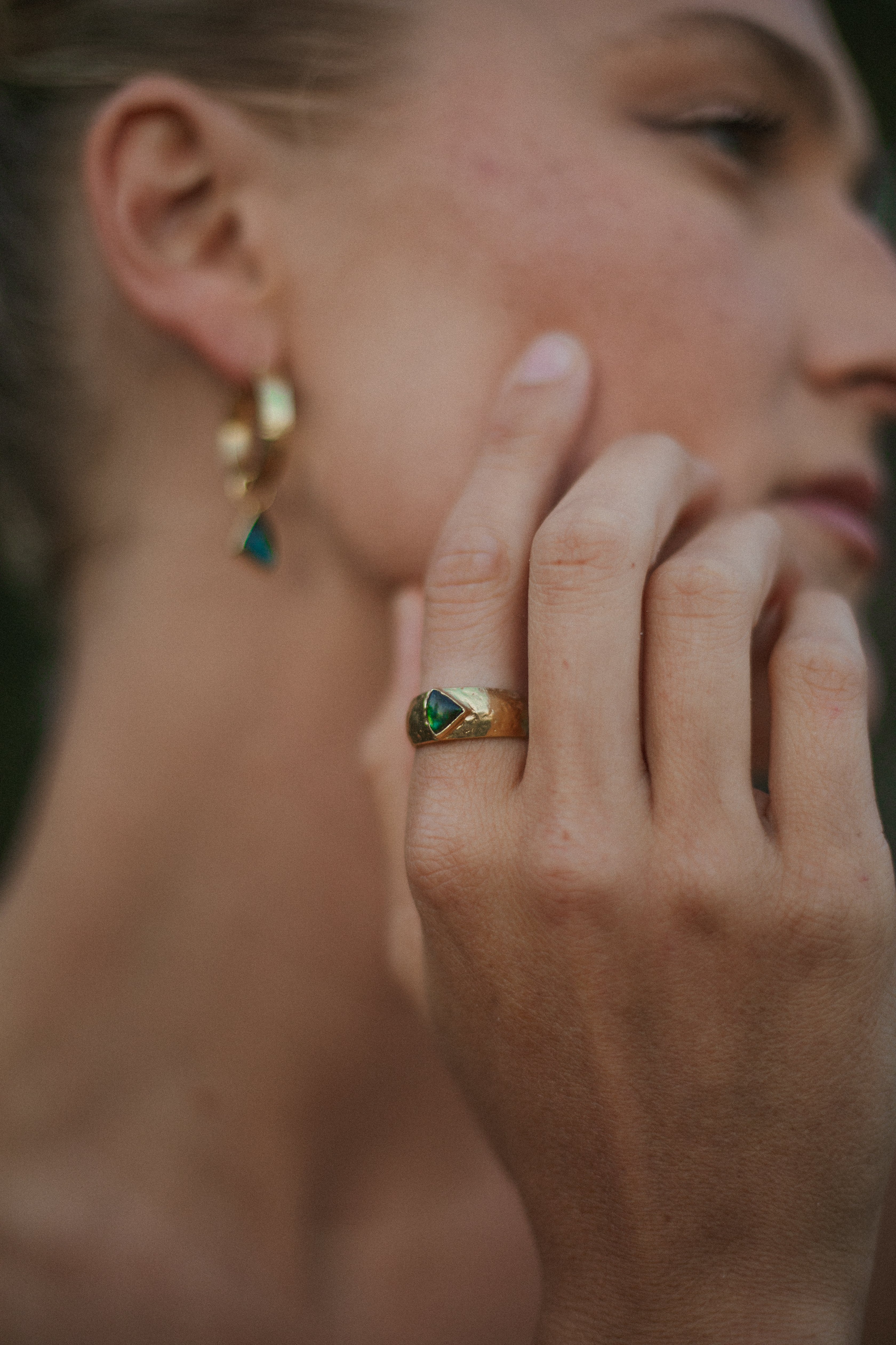 Miri gold with labradorite stone worn